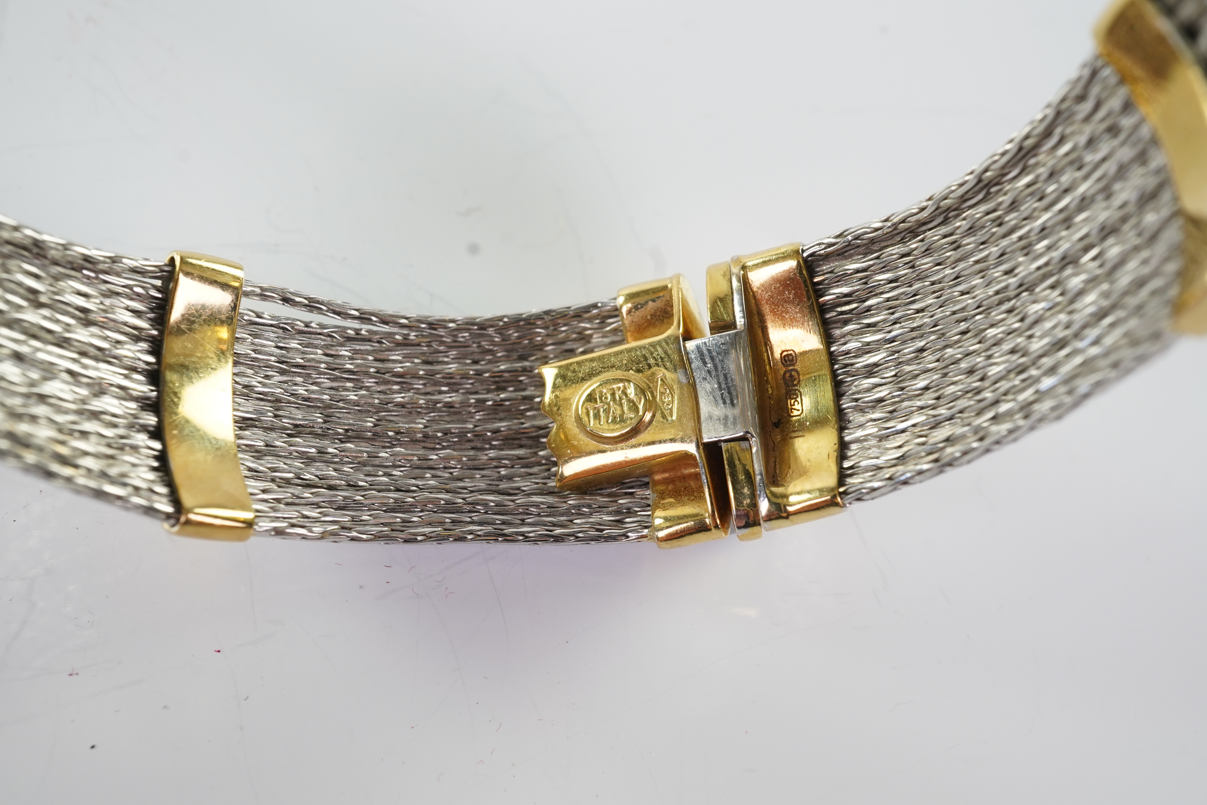 An 18ct gold collar and bangle